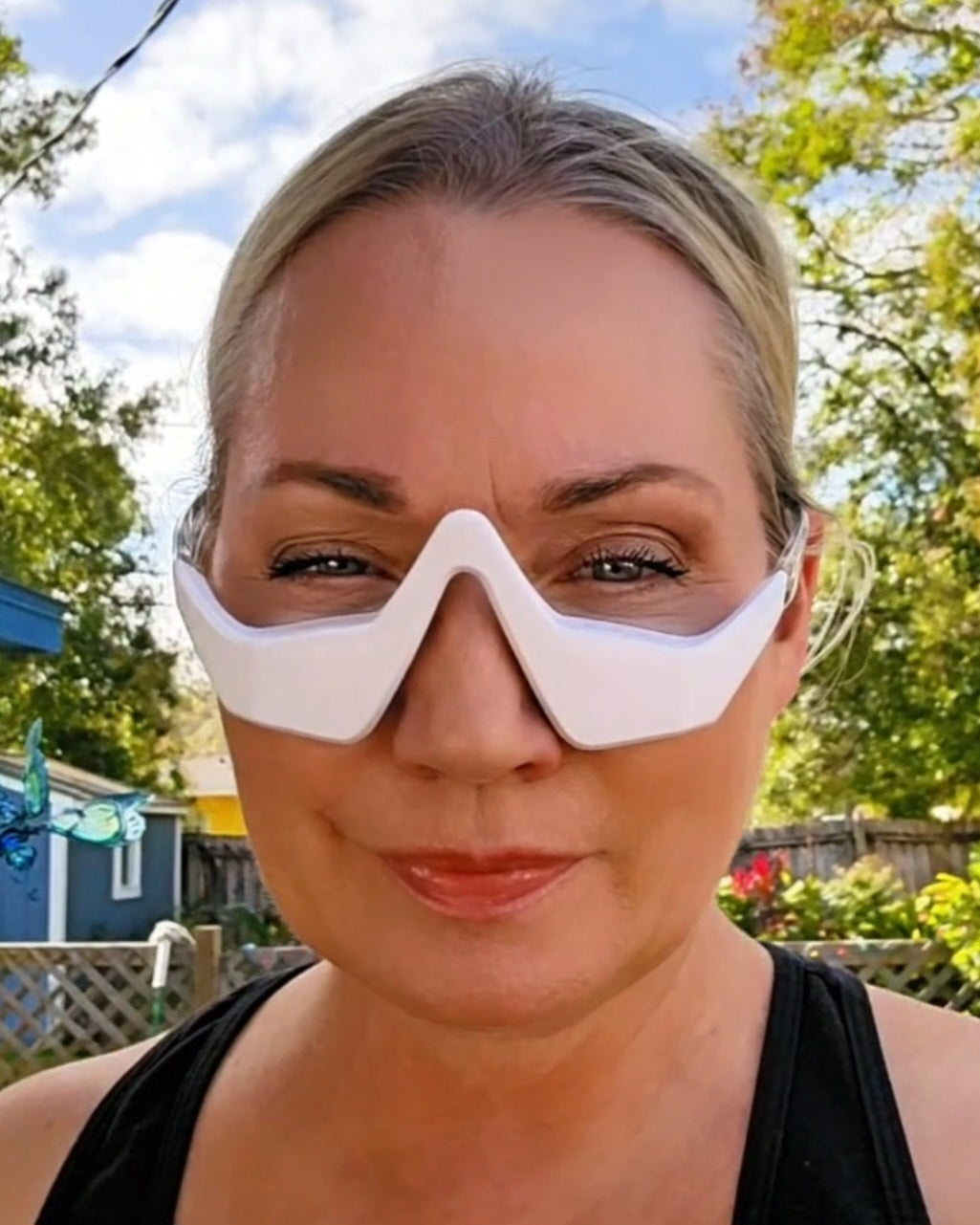 Women using RevitalEyes™ 2-in-1 Red Light + EMS Under-Eye Therapy
